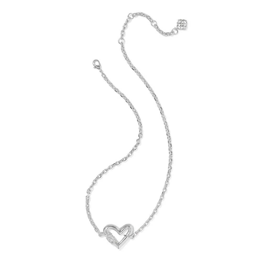 Silver necklace with a heart pendant on a white background