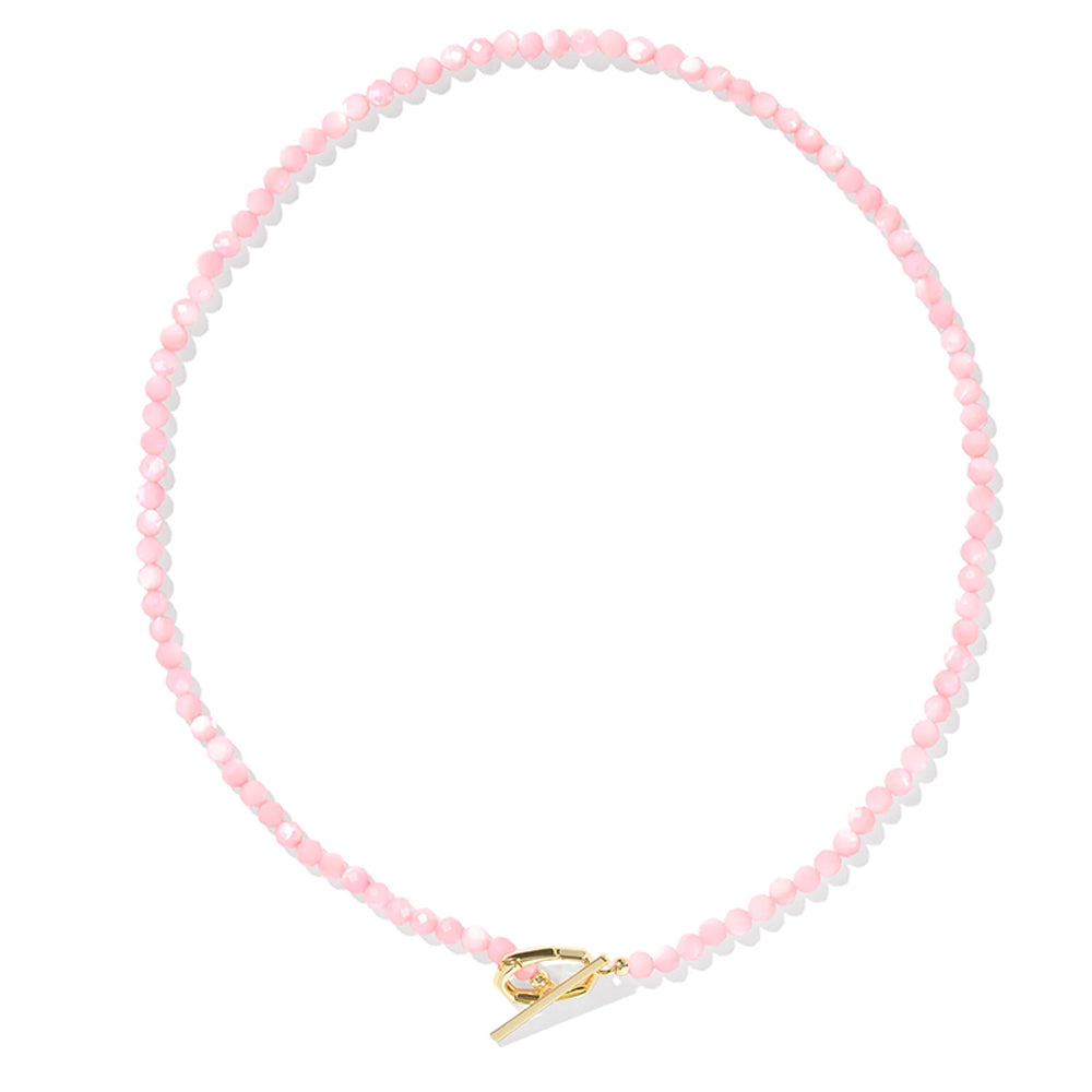 Pink beaded necklace with a gold clasp on a white background