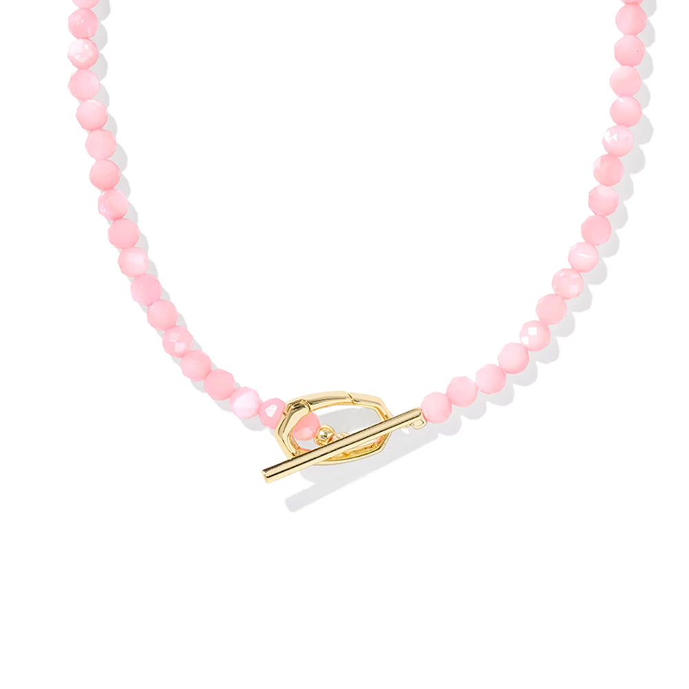 Necklace with pink and white beads and a gold clasp on a white background