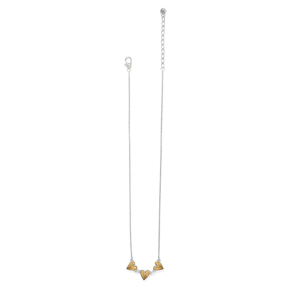 Necklace with gold heart pendants on a white background