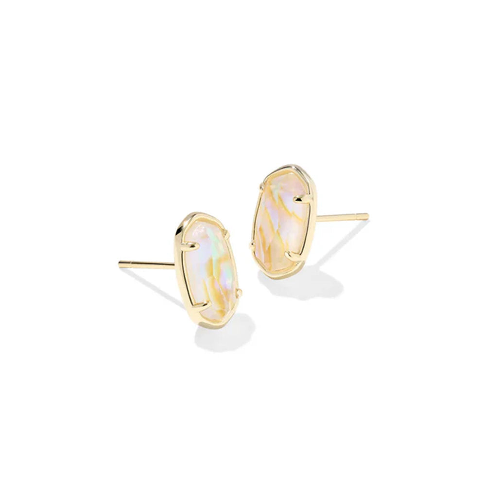 Gold earrings with white stone on a white background