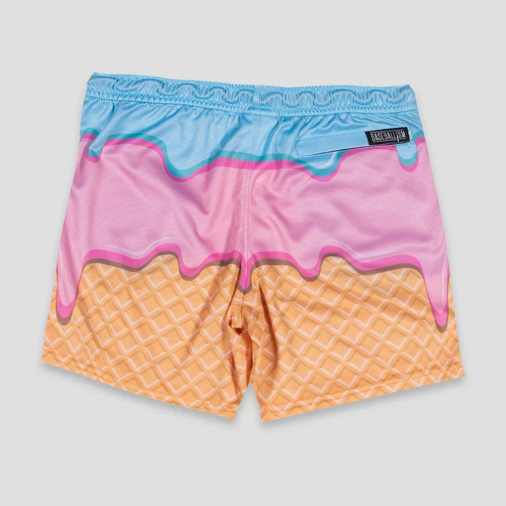 A pair of shorts featuring a 3D ice cream dip design, with a light blue top layer, pink middle layer, and orange waffle cone bottom, shown against a light gray background.