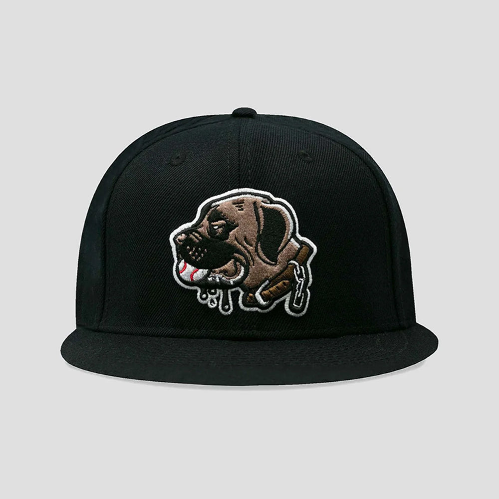A black flat-brim snapback cap featuring a detailed embroidered patch of a brown dog with dripping white and red accents on the front, set against a solid light gray background.