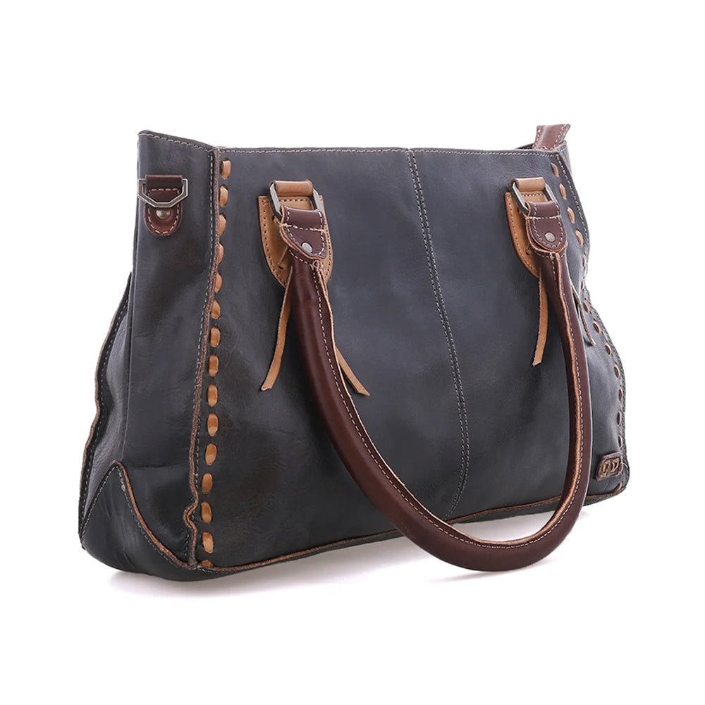 A dark charcoal gray leather handbag with brown leather handles, trim, and stitching, shown on a plain white background.