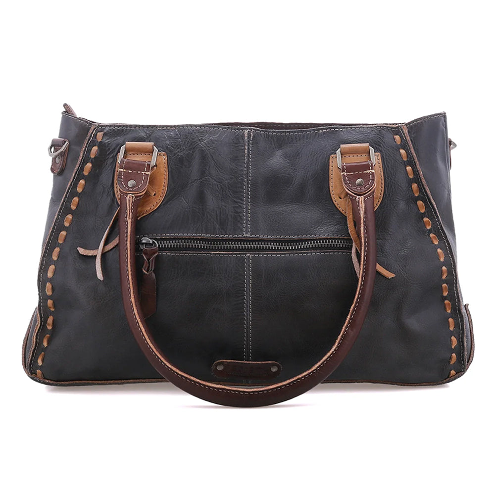 A black leather shoulder bag with dark brown leather handles, trim, and zipper details, featuring decorative stitching along the edges, shown against a plain white background.