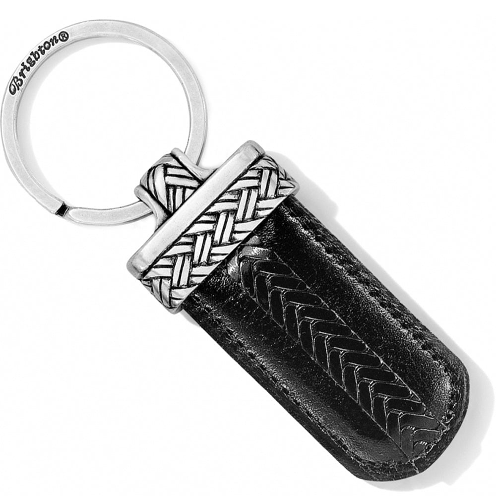 Black leather keychain with braided design on a white background