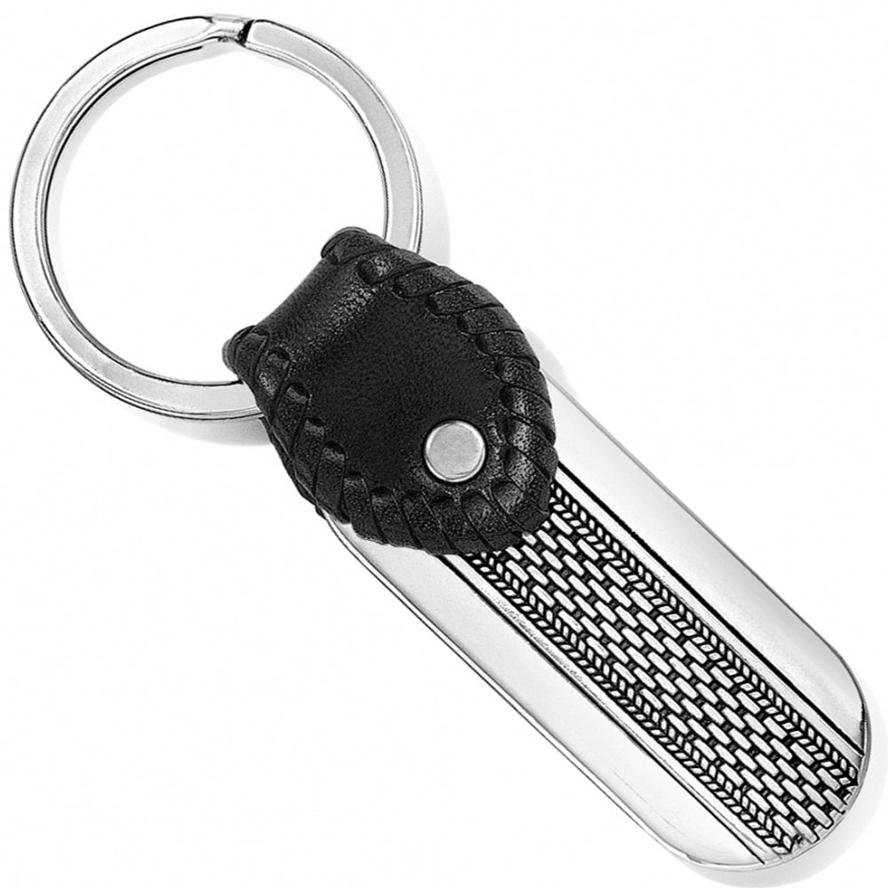 Keychain with black leather strap and metallic finish on a white background