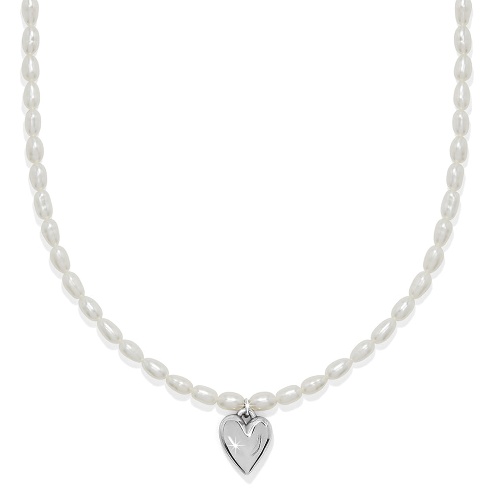 Pearl necklace with a silver heart pendant on a white background