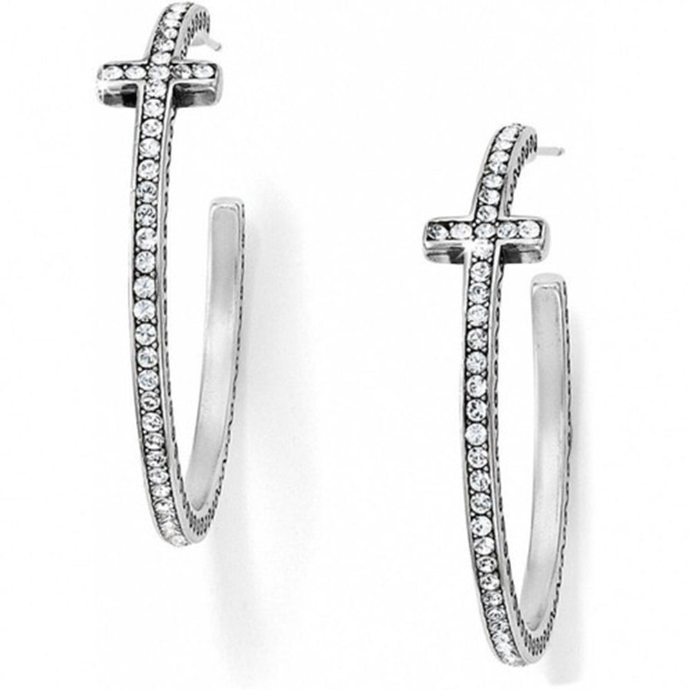 Silver hoop earrings with embedded stones on a white background