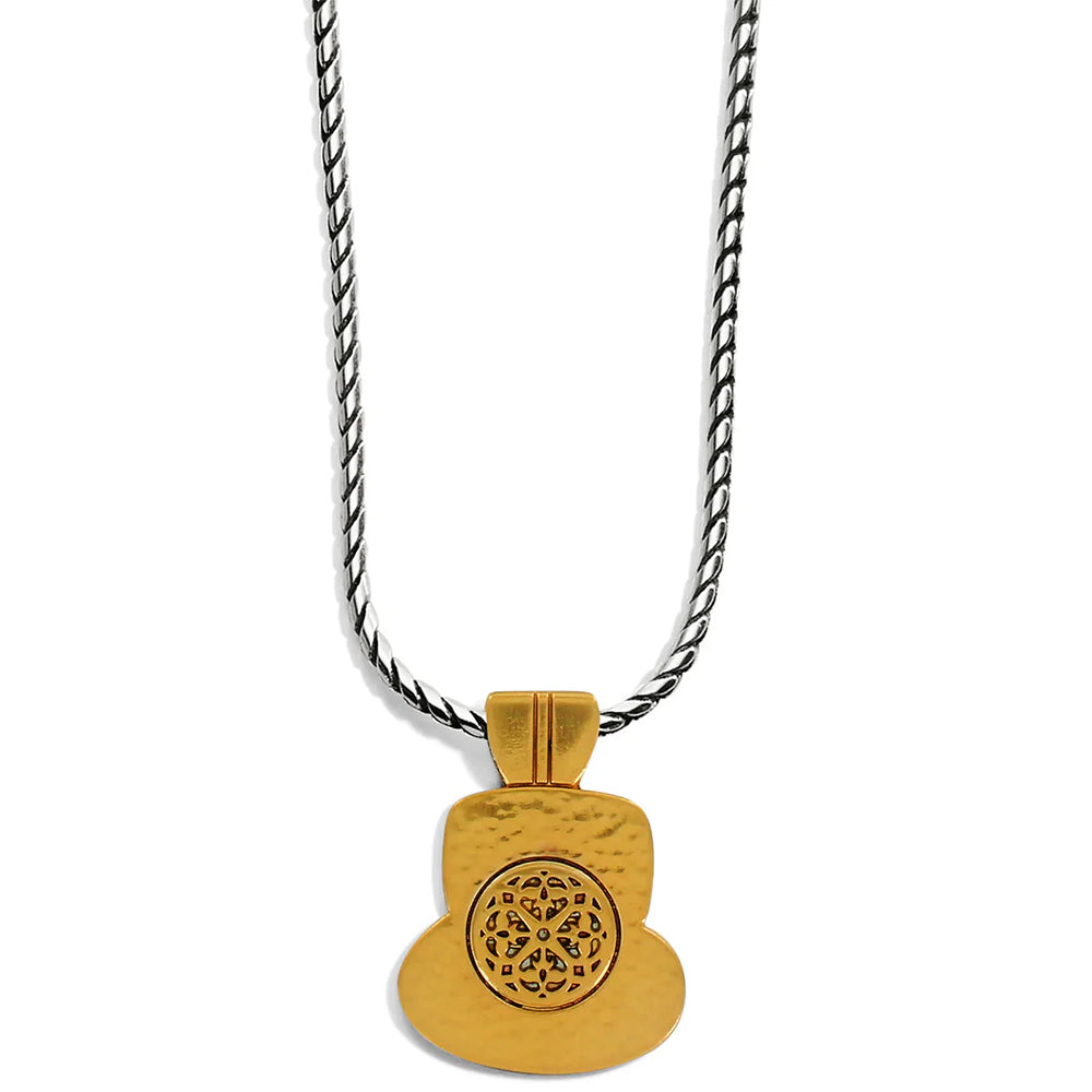 Gold pendant necklace with intricate design on a white background