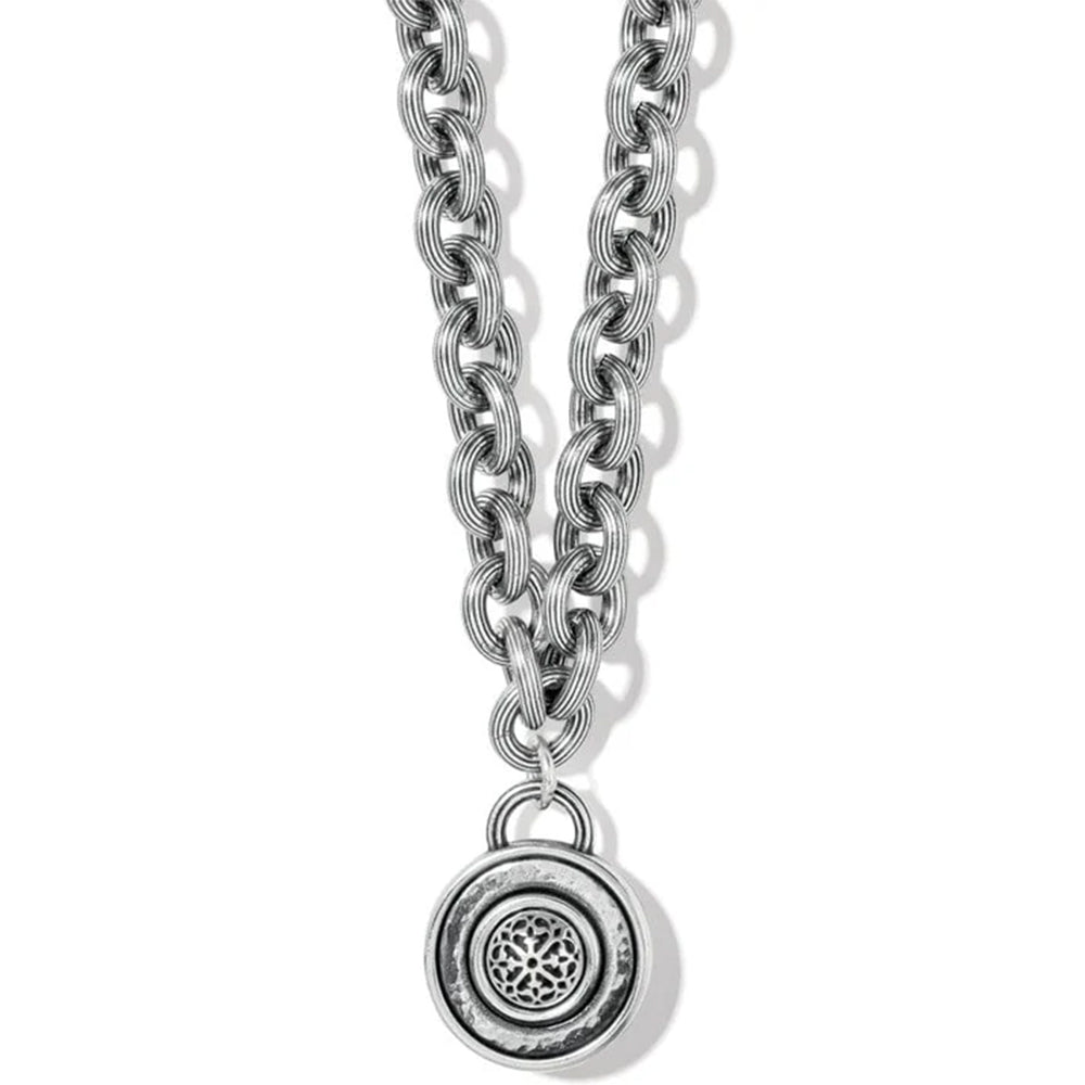 Silver chain necklace with a pendant on a white background