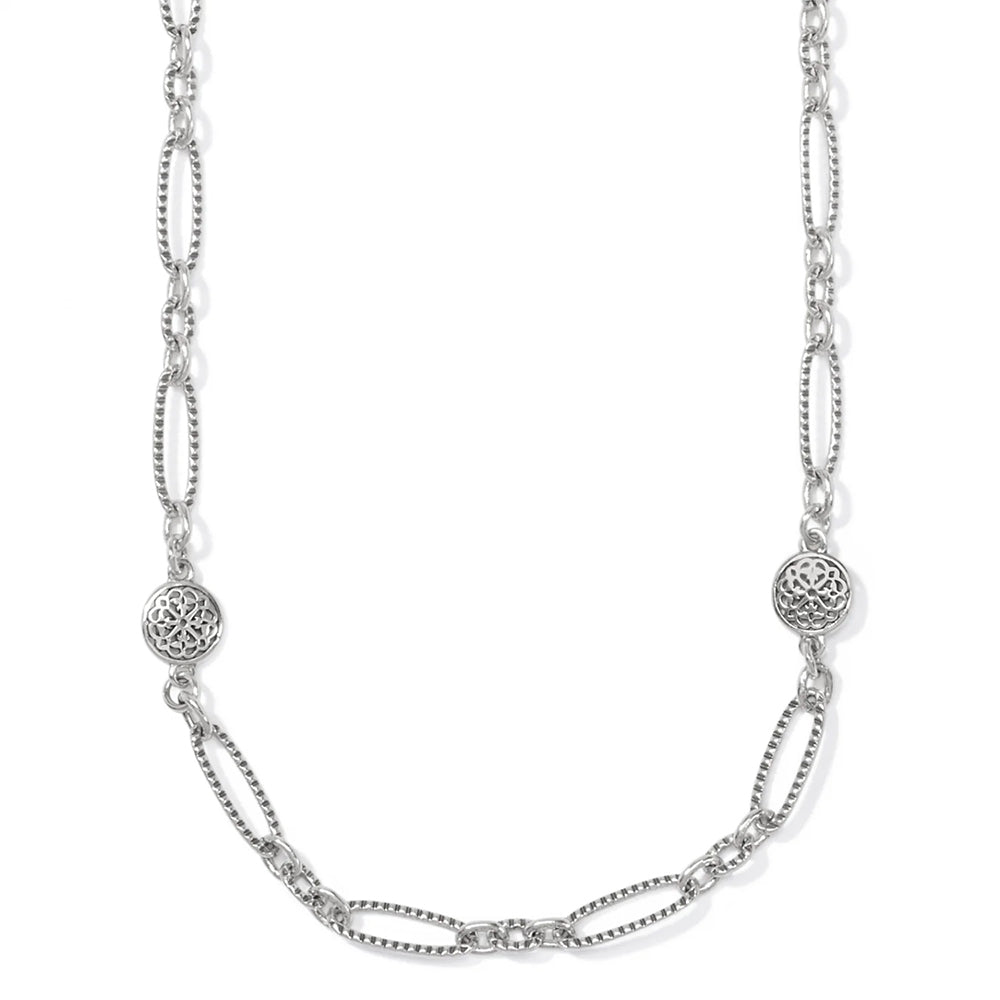 Silver chain necklace with decorative links on a white background