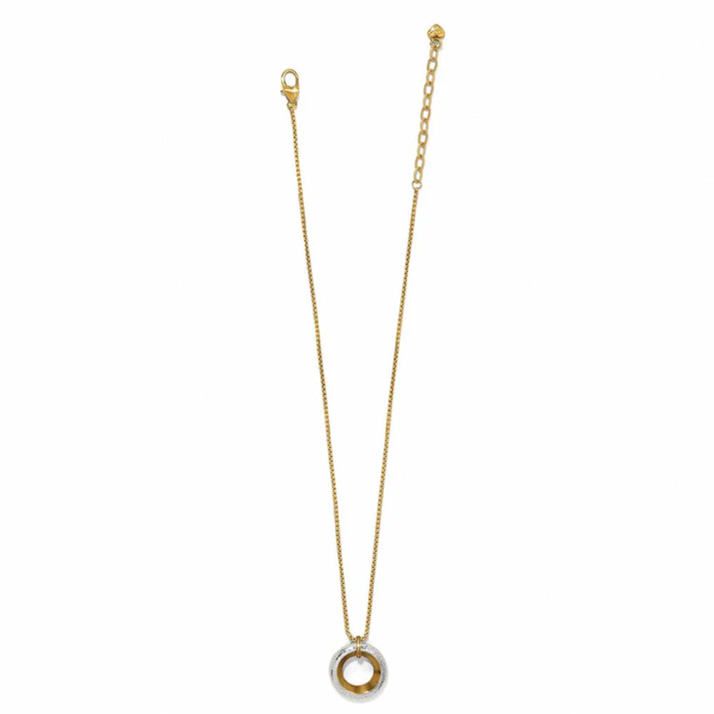 Gold necklace with a small pendant on a white background