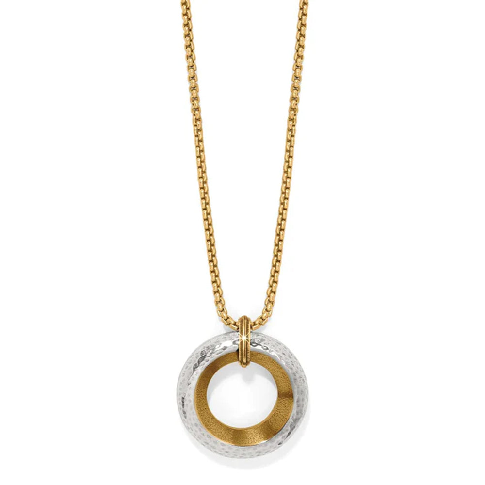 Gold and silver circular pendant necklace on a white background