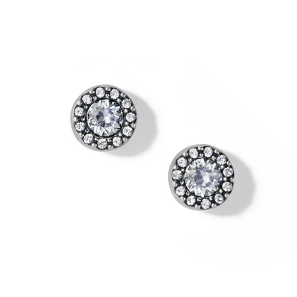 Pair of round stud earrings with clear gemstones on a white background