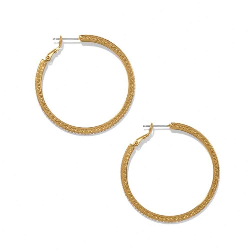 A pair of large gold hoop earrings with a textured, woven-like pattern along the outer edge, shown on a plain white background.