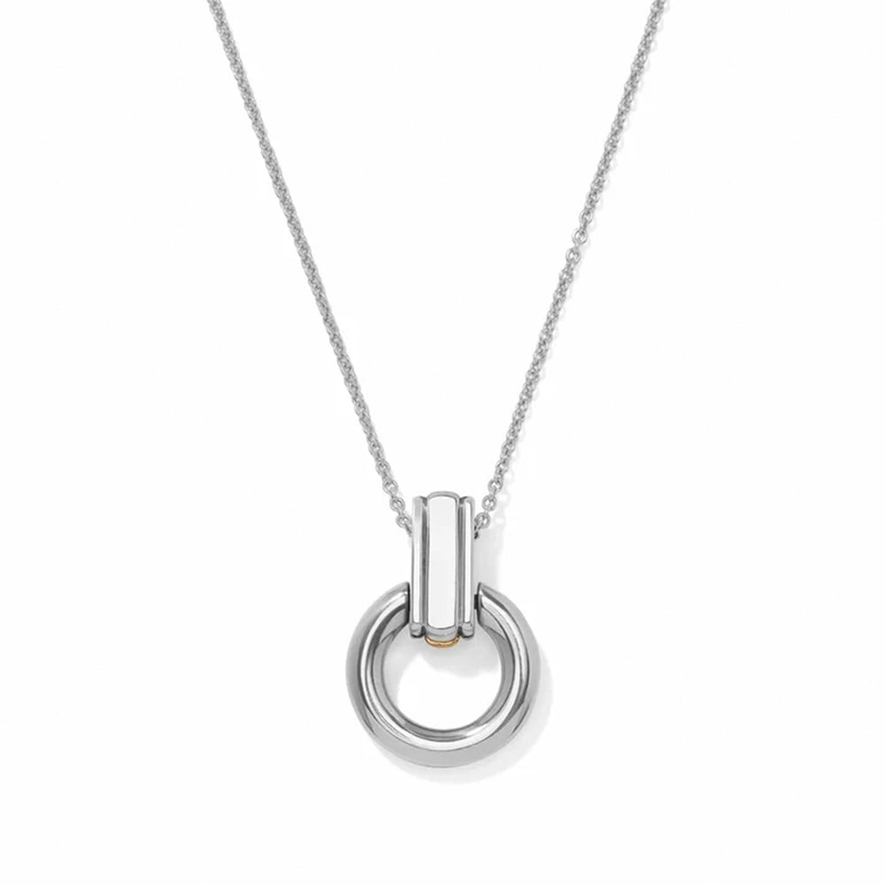 A silver pendant necklace featuring a polished cylindrical bar connected to a thick circular ring, suspended from a delicate silver chain against a white background.