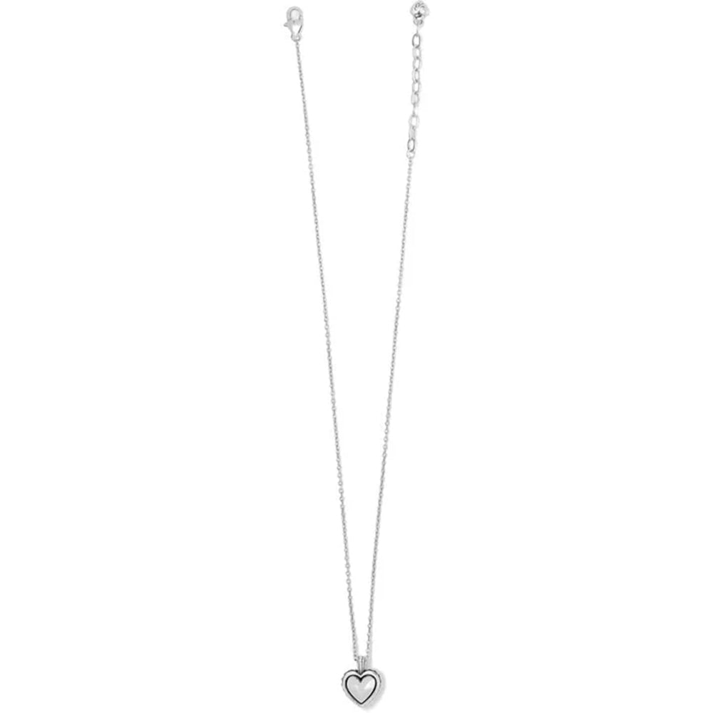 Silver necklace with a heart-shaped pendant on a white background