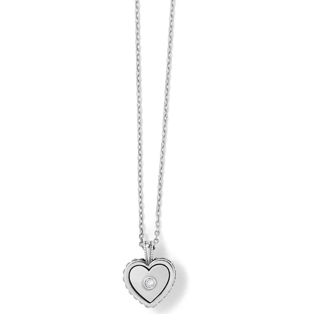 Heart-shaped pendant necklace with a diamond on a white background