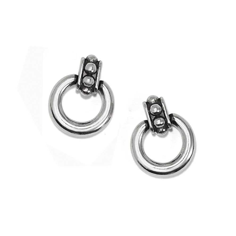 Pair of silver hoop earrings on a white background