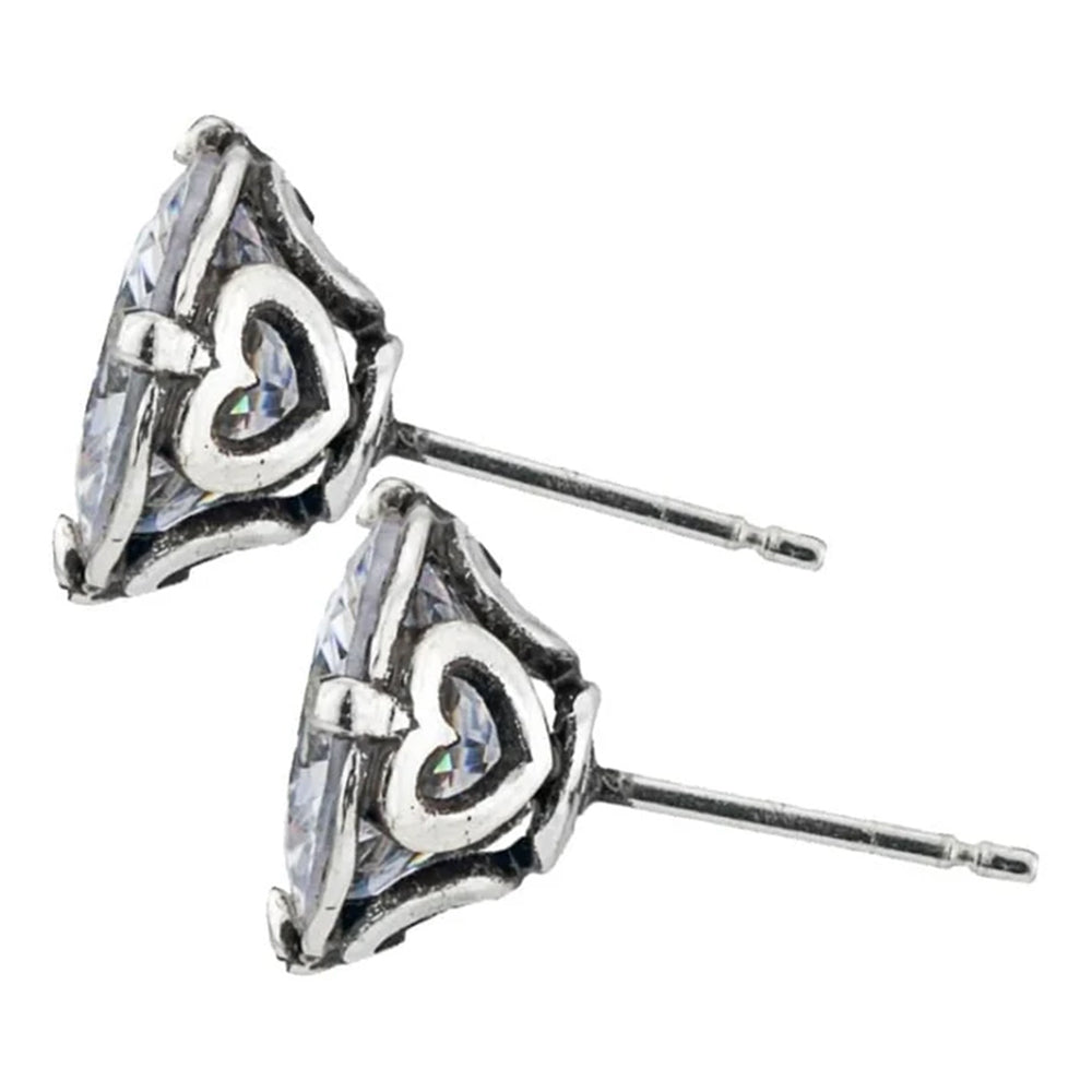 Pair of silver earrings with heart and triangle design on a white background
