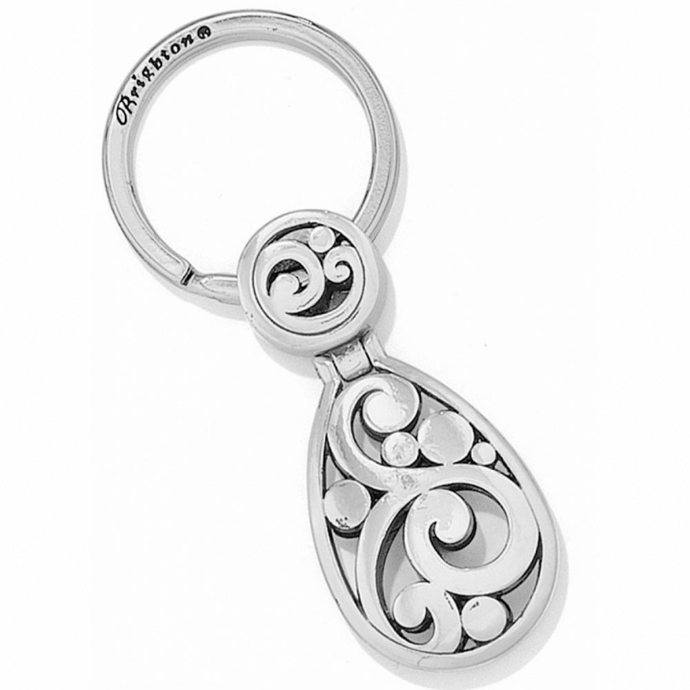 Silver keychain with intricate design on a white background