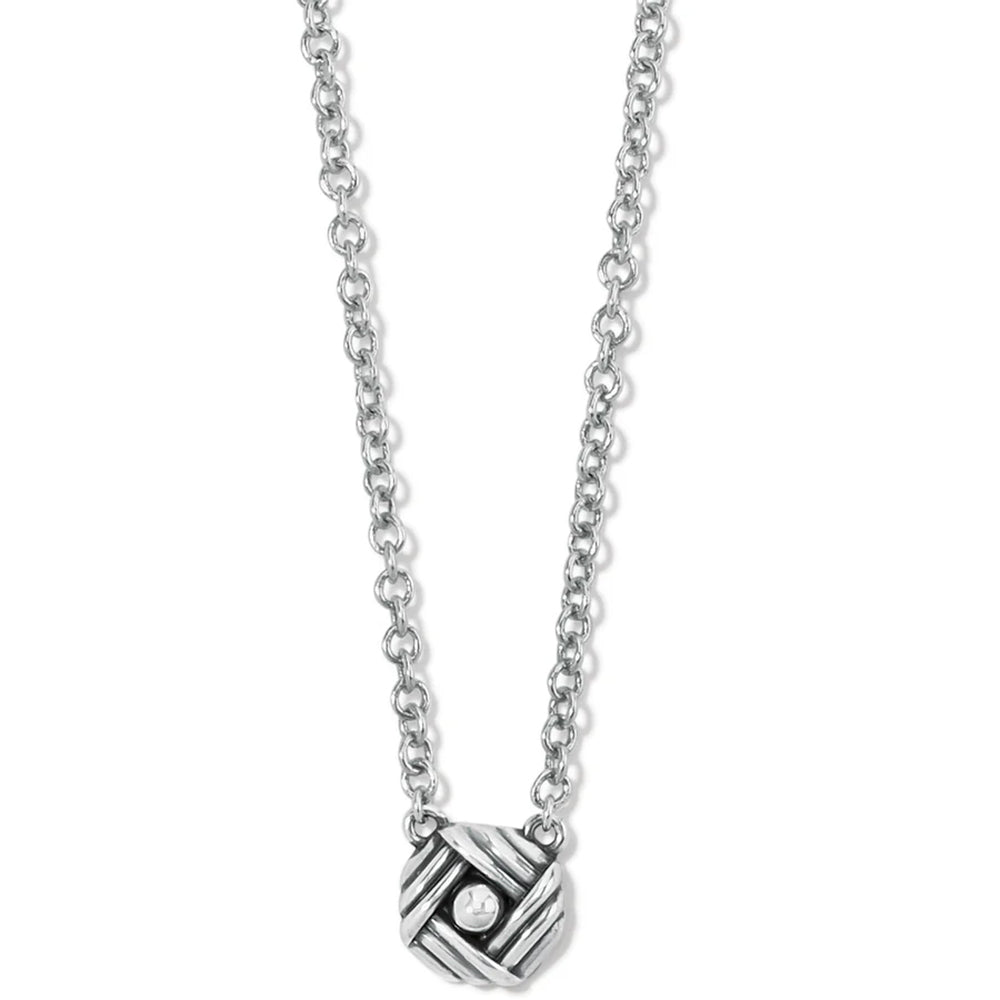 Silver necklace with a geometric pendant on a white background