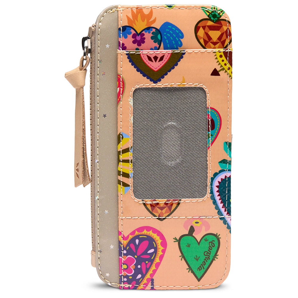 A vertical zip-around wallet in peach-colored faux leather with a colorful heart pattern and a clear ID window, shown on a white background.