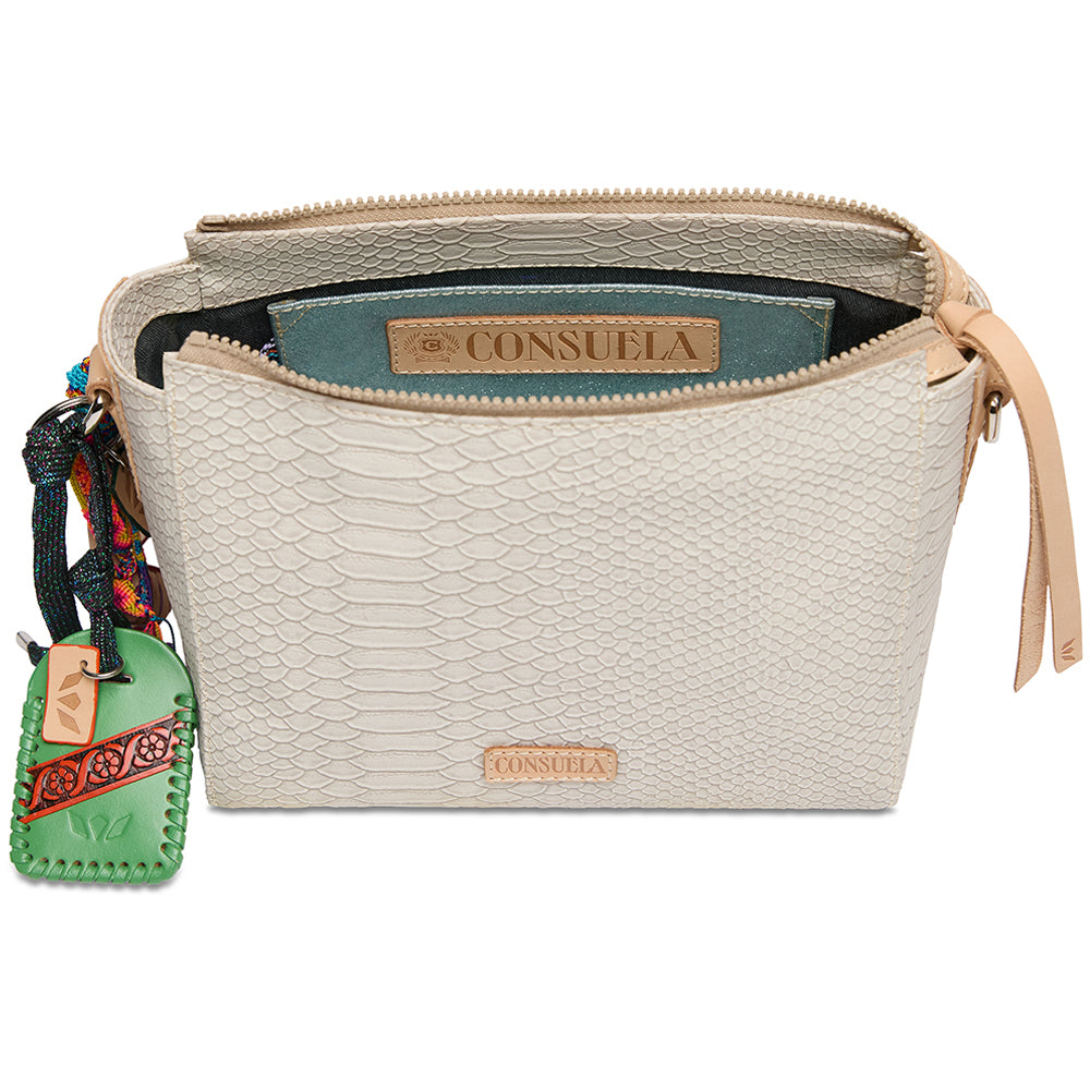 Beige handbag with 'Consuela' branding on a white background