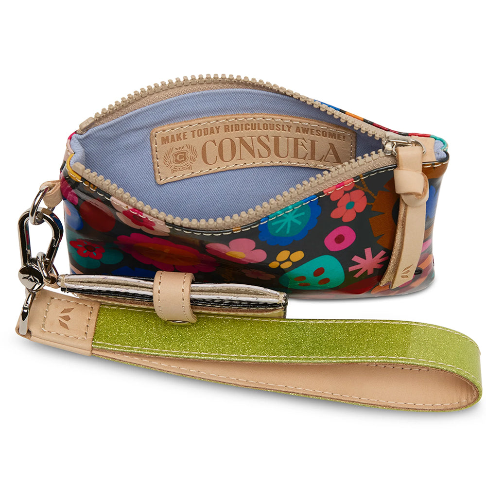 Colorful handbag with floral pattern and visible brand name on a white background