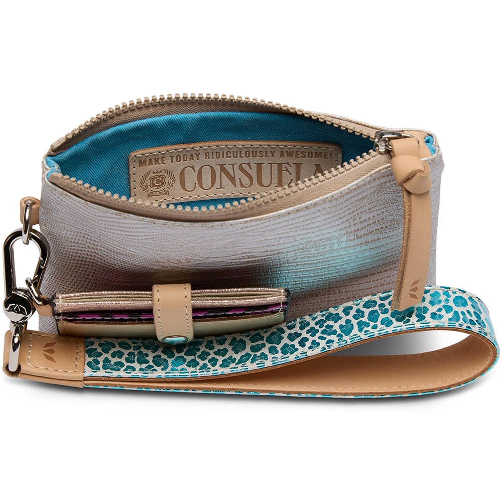 Open handbag with blue interior and leopard print strap on a white background