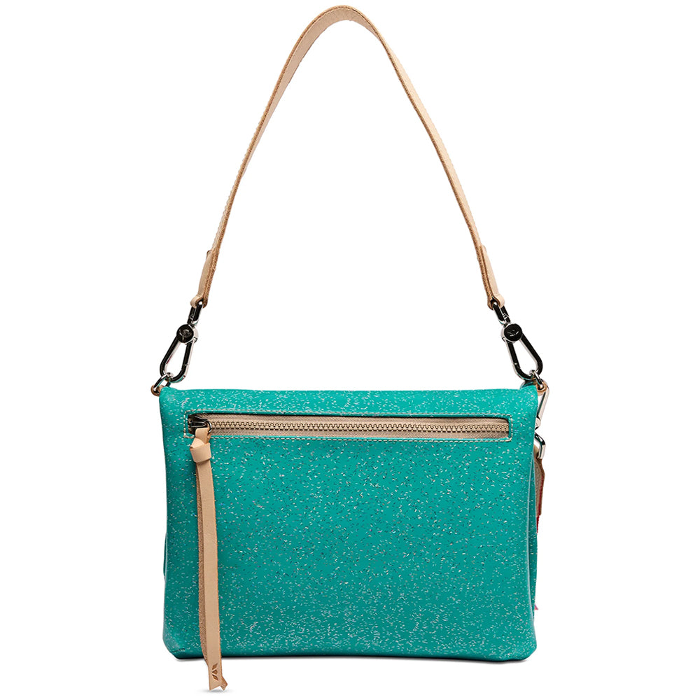 A turquoise glitter crossbody bag with a tan shoulder strap and gold-tone hardware, shown against a plain white background.