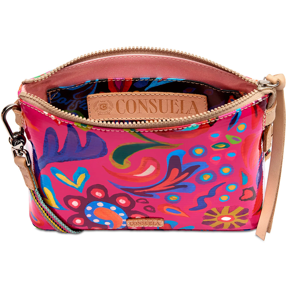 Colorful handbag with floral pattern and 'Consuela' branding on a white background