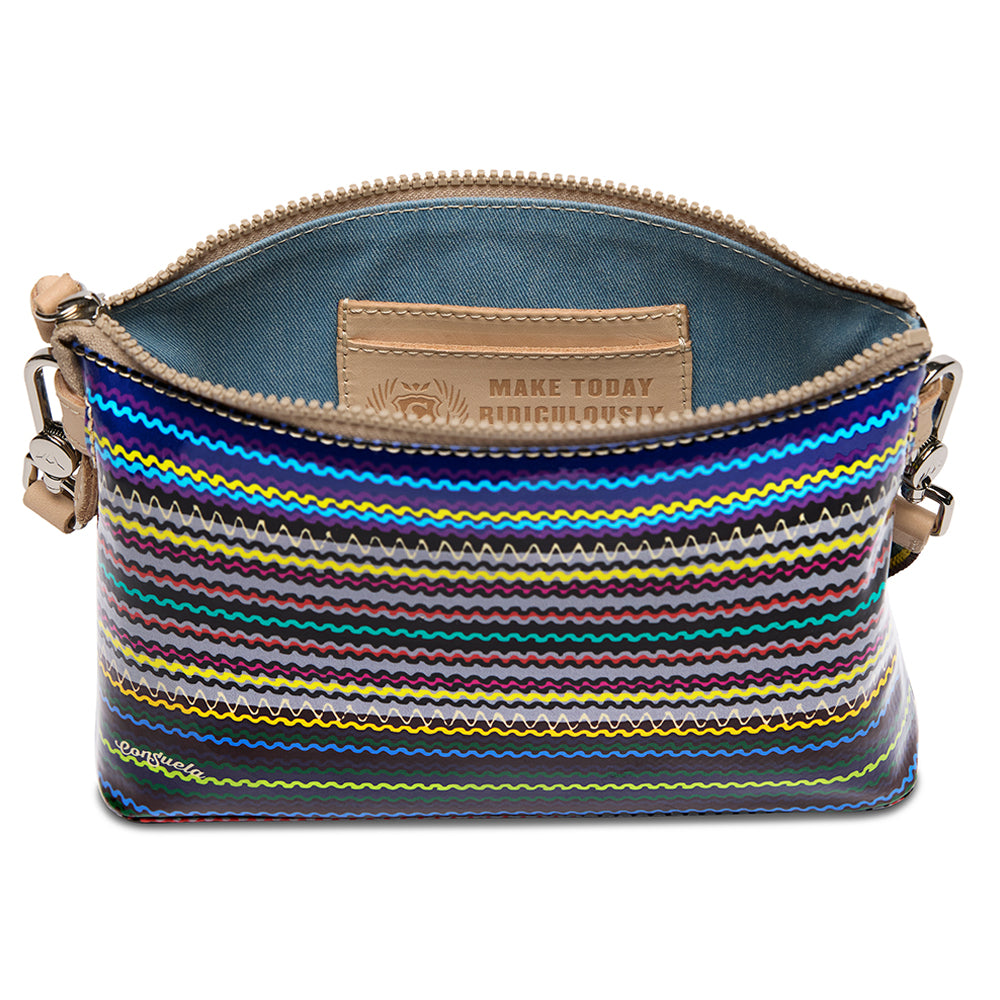 Multicolored striped bag with a visible brand label on a white background