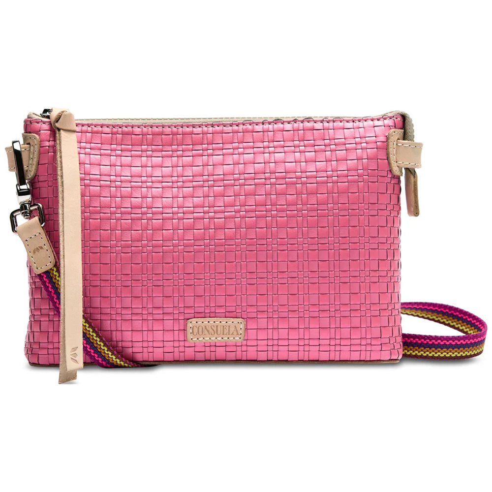 Pink woven handbag with a strap on a white background
