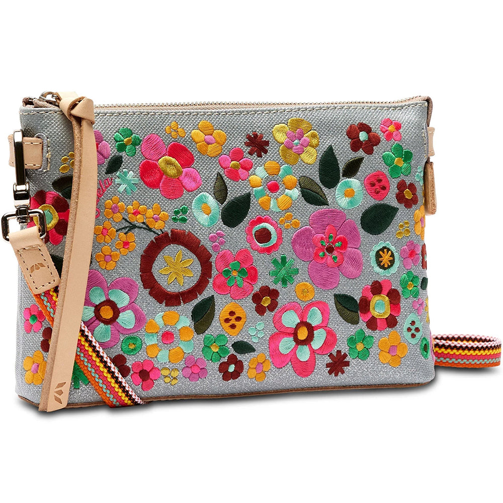 Colorful floral embroidered clutch bag with a strap on a white background