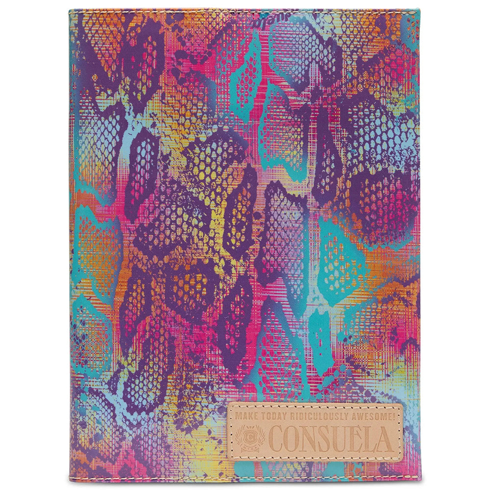 Colorful patterned notebook with a brand label on a white background