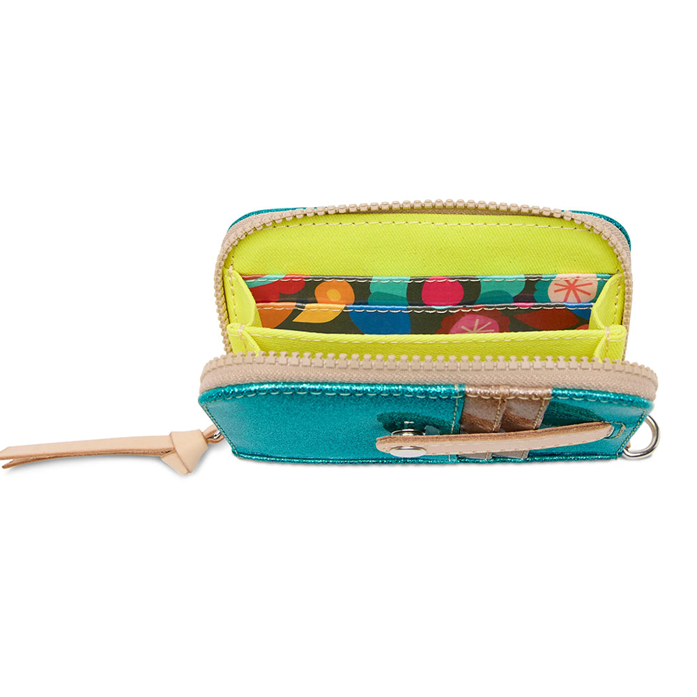 Small turquoise wallet with a colorful interior on a white background