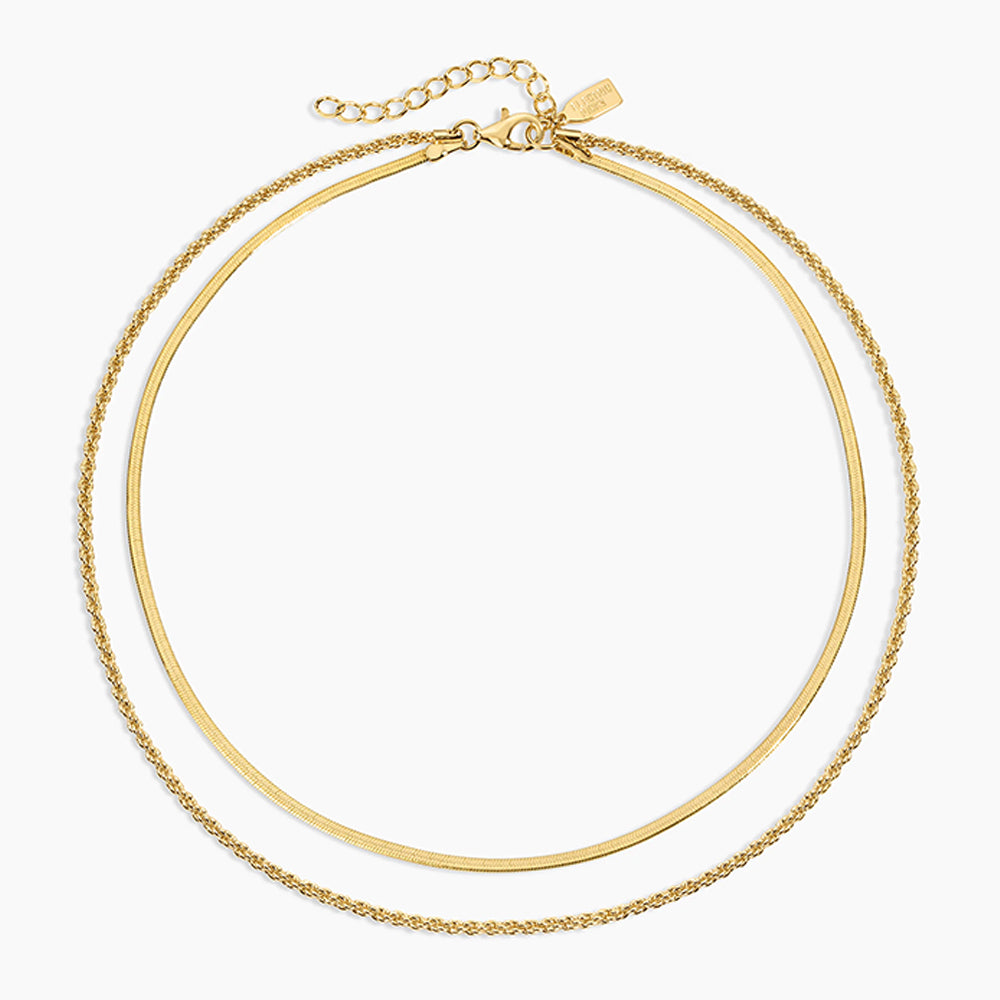 Gold necklace on a white background