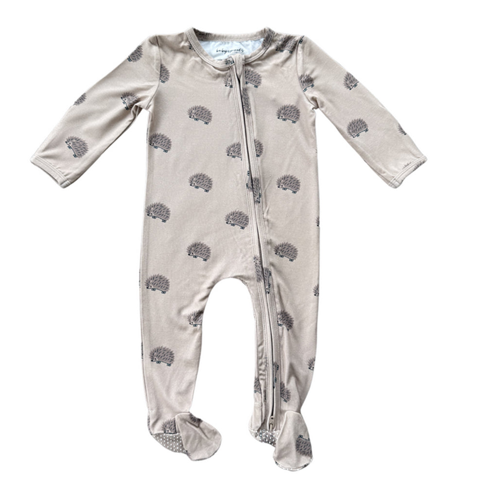 Baby onesie with hedgehog pattern on a white background