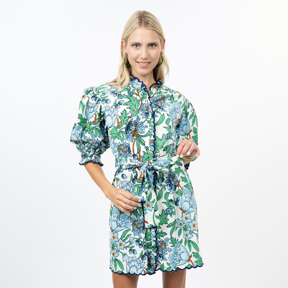 Woman wearing a floral dress on a white background