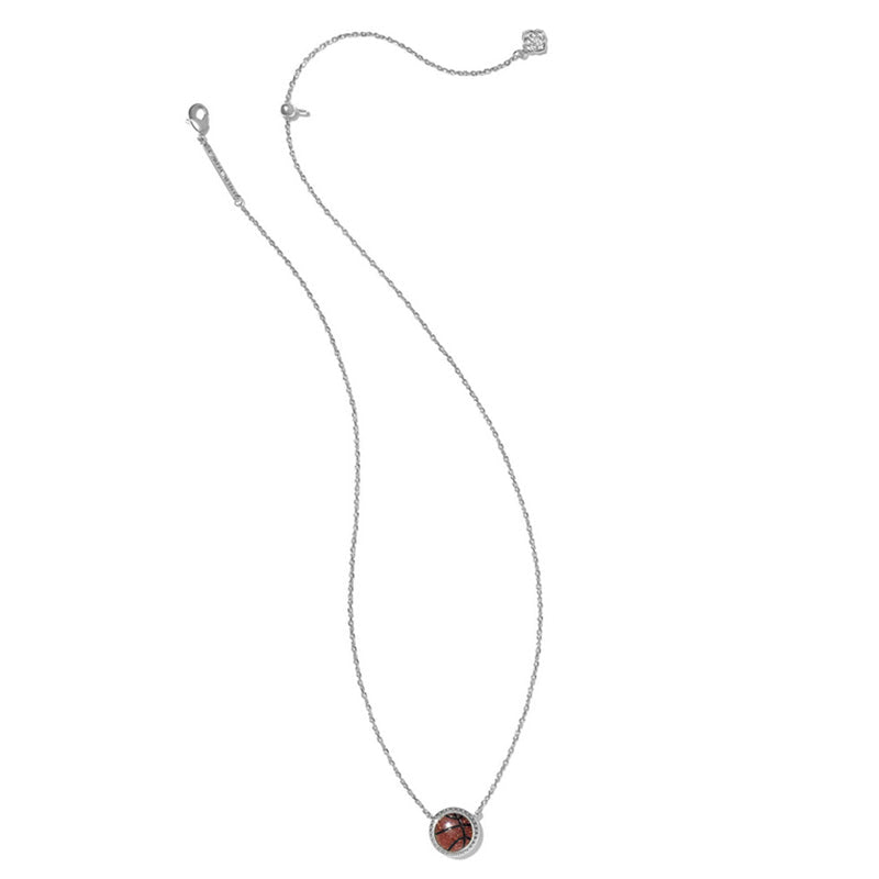 A silver-colored pendant necklace with a basketball-shaped pendant featuring orange goldstone.