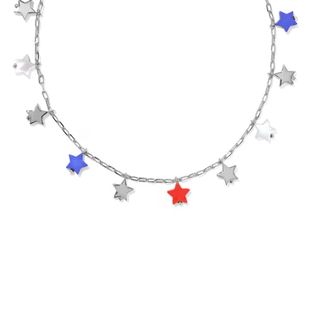 A silver chain necklace featuring dangling star charms in red, blue, and silver, displayed against a solid white background.