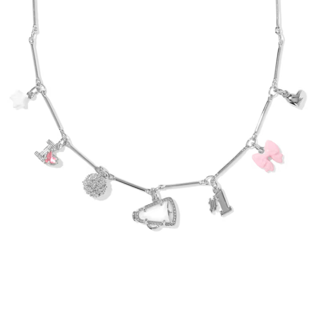 A silver beaded necklace with small dangling charms, including a pink flamingo, a pink heart, a silver moon, and a silver heart, displayed on a clean white background.