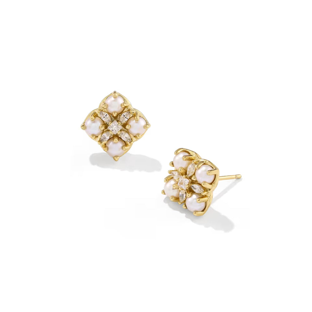 A pair of gold stud earrings with white pearl-like floral clusters and small clear stones, shown on a clean white background.