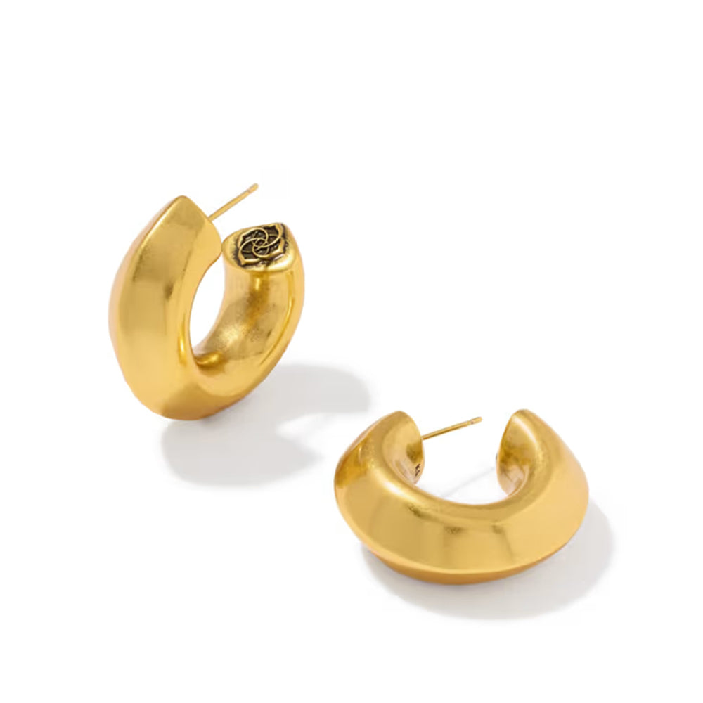 A pair of chunky, polished gold crescent-shaped hoop earrings on a clean white background.