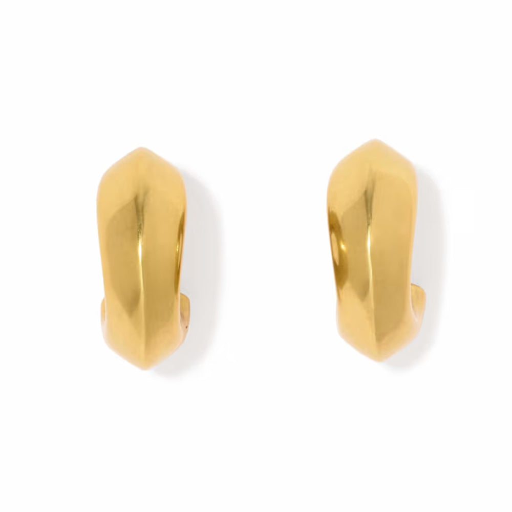 A pair of polished gold huggie hoop earrings with a modern, faceted geometric design, shown on a clean white background.