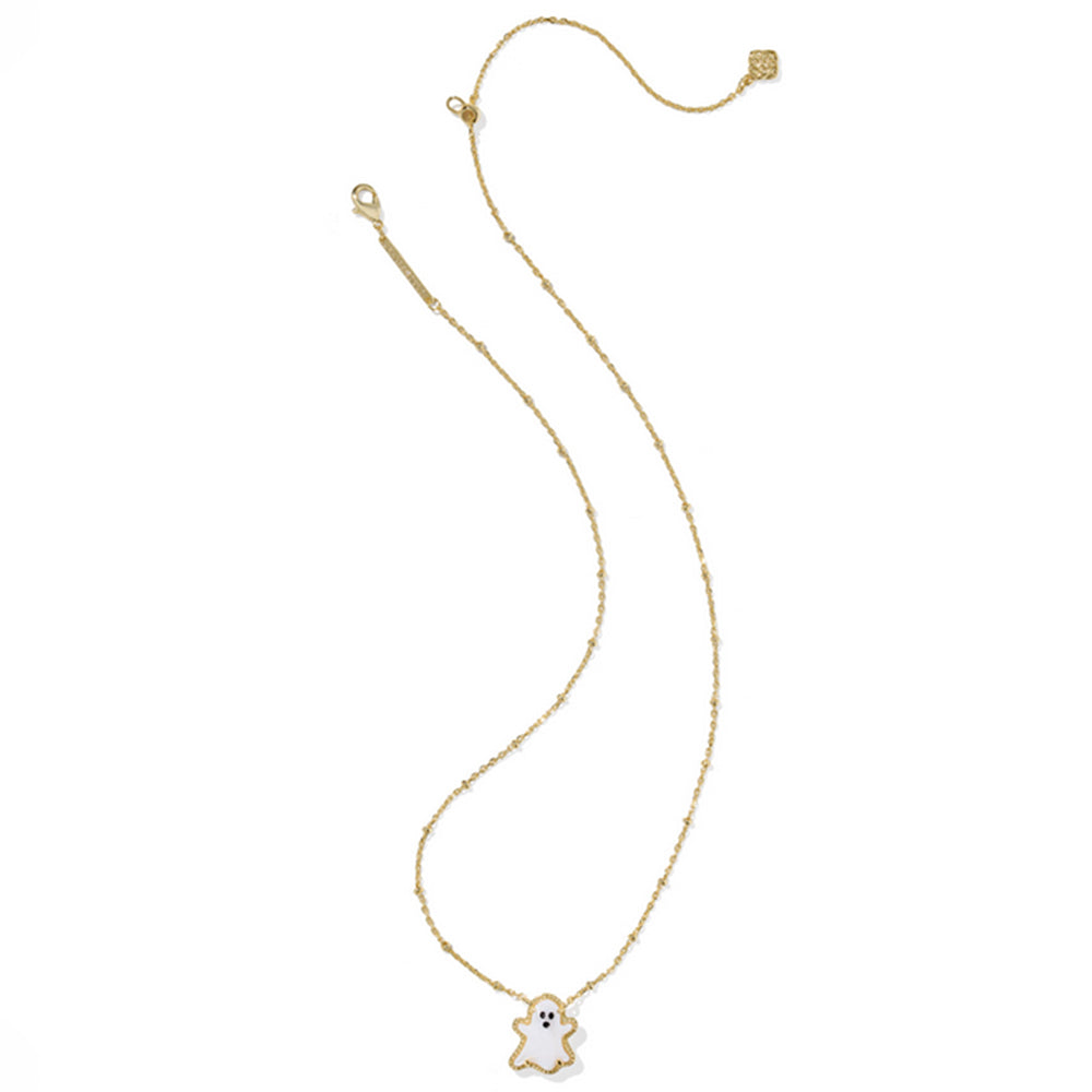 Gold necklace with a small white pendant on a white background