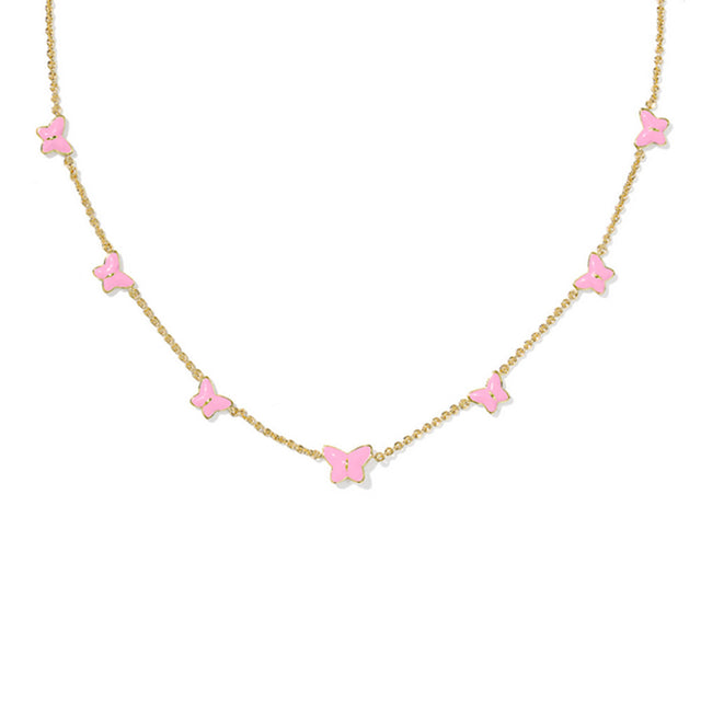 Necklace with pink butterfly pendants on a gold chain against a white background
