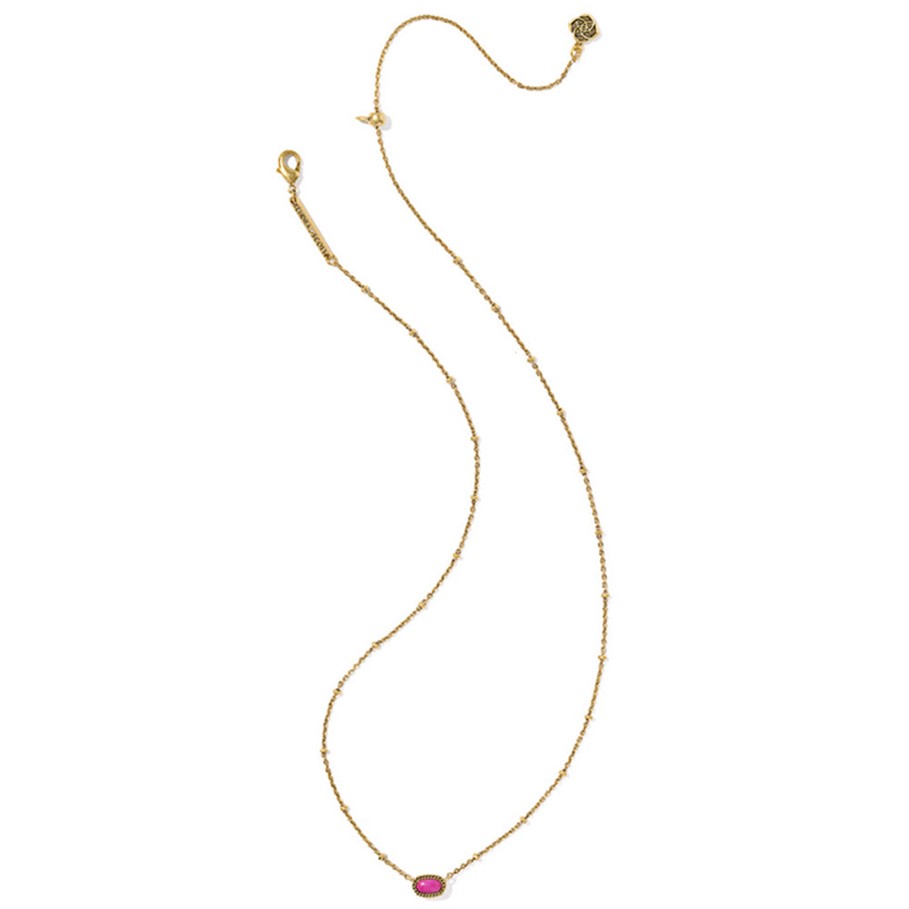 Gold necklace with a pink gemstone on a white background